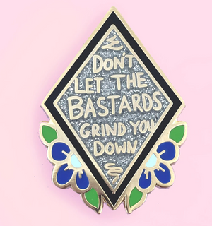 Jubly Umph Lapel Pin • Don't Let The Bastards Grind You Down