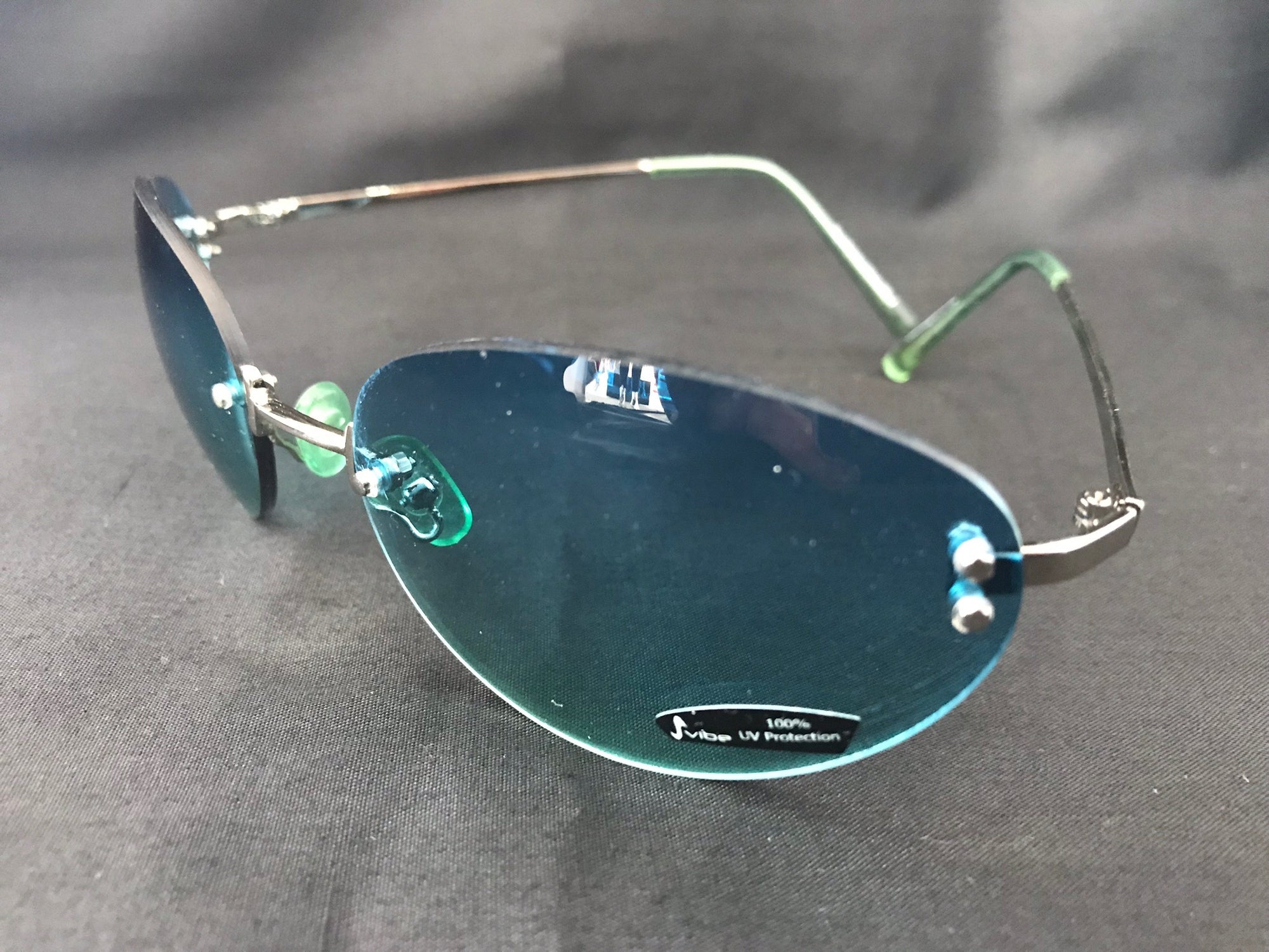 Sunglasses • Blue Green Lens